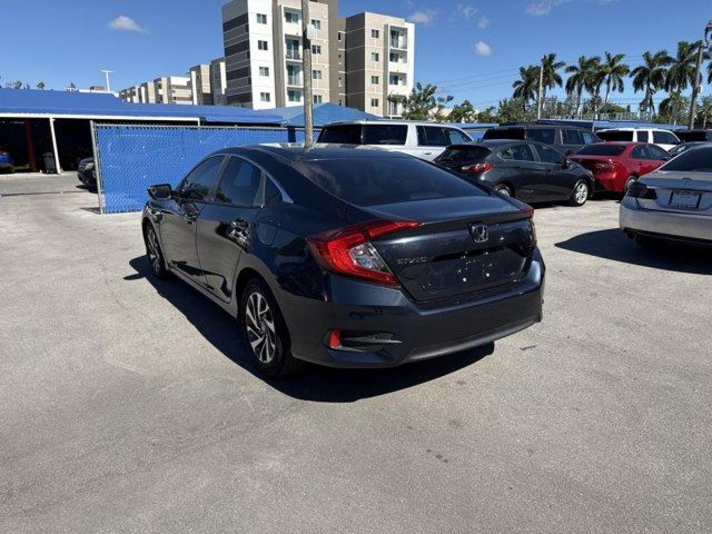 2016 Blue Honda Civic Sedan (19XFC2F70GE) with an 4 2.0 L engine, Variable transmission, located at 27610 S Dixie Hwy, Homestead, FL, 33032, (305) 749-2348, 25.510241, -80.438301 - IIHS Top Safety Pick+. Only 98,630 Miles! Scores 41 Highway MPG and 31 City MPG! This Honda Civic Sedan delivers a Regular Unleaded I-4 2.0 L/122 engine powering this Variable transmission. Window Grid Antenna, Wheels: 16 Alloy, Wheels w/Silver Accents.* This Honda Civic Sedan Features the Following - Photo#2