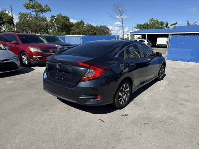 2016 Blue Honda Civic Sedan (19XFC2F70GE) with an 4 2.0 L engine, Variable transmission, located at 27610 S Dixie Hwy, Homestead, FL, 33032, (305) 749-2348, 25.510241, -80.438301 - IIHS Top Safety Pick+. Only 98,630 Miles! Scores 41 Highway MPG and 31 City MPG! This Honda Civic Sedan delivers a Regular Unleaded I-4 2.0 L/122 engine powering this Variable transmission. Window Grid Antenna, Wheels: 16 Alloy, Wheels w/Silver Accents.* This Honda Civic Sedan Features the Following - Photo#4
