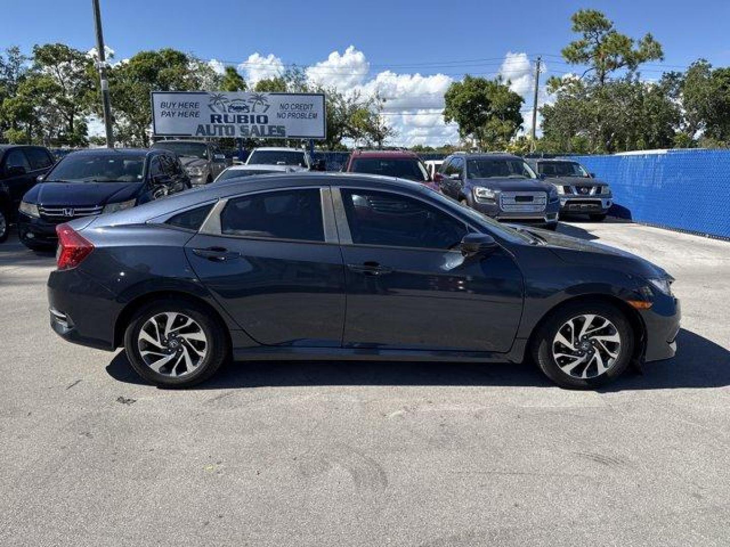 2016 Blue Honda Civic Sedan (19XFC2F70GE) with an 4 2.0 L engine, Variable transmission, located at 27610 S Dixie Hwy, Homestead, FL, 33032, (305) 749-2348, 25.510241, -80.438301 - IIHS Top Safety Pick+. Only 98,630 Miles! Scores 41 Highway MPG and 31 City MPG! This Honda Civic Sedan delivers a Regular Unleaded I-4 2.0 L/122 engine powering this Variable transmission. Window Grid Antenna, Wheels: 16 Alloy, Wheels w/Silver Accents.* This Honda Civic Sedan Features the Following - Photo#5
