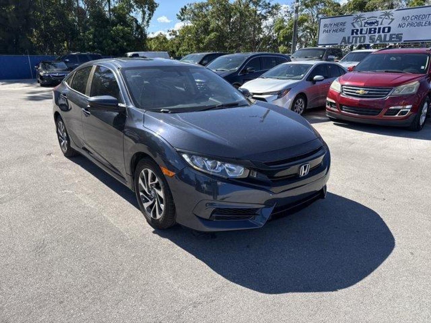 2016 Blue Honda Civic Sedan (19XFC2F70GE) with an 4 2.0 L engine, Variable transmission, located at 27610 S Dixie Hwy, Homestead, FL, 33032, (305) 749-2348, 25.510241, -80.438301 - IIHS Top Safety Pick+. Only 98,630 Miles! Scores 41 Highway MPG and 31 City MPG! This Honda Civic Sedan delivers a Regular Unleaded I-4 2.0 L/122 engine powering this Variable transmission. Window Grid Antenna, Wheels: 16 Alloy, Wheels w/Silver Accents.* This Honda Civic Sedan Features the Following - Photo#6