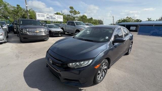 2016 Gray Honda Civic Sedan (19XFC2F70GE) with an 4 2.0 L engine, Variable transmission, located at 27610 S Dixie Hwy, Homestead, FL, 33032, (305) 749-2348, 25.510241, -80.438301 - IIHS Top Safety Pick+. Only 98,630 Miles! Scores 41 Highway MPG and 31 City MPG! This Honda Civic Sedan delivers a Regular Unleaded I-4 2.0 L/122 engine powering this Variable transmission. Window Grid Antenna, Wheels: 16 Alloy, Wheels w/Silver Accents.* This Honda Civic Sedan Features the Following- Photo#0