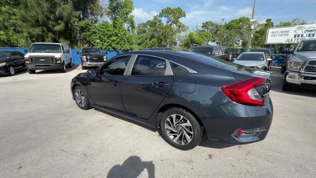 2016 Gray Honda Civic Sedan (19XFC2F70GE) with an 4 2.0 L engine, Variable transmission, located at 27610 S Dixie Hwy, Homestead, FL, 33032, (305) 749-2348, 25.510241, -80.438301 - IIHS Top Safety Pick+. Only 98,630 Miles! Scores 41 Highway MPG and 31 City MPG! This Honda Civic Sedan delivers a Regular Unleaded I-4 2.0 L/122 engine powering this Variable transmission. Window Grid Antenna, Wheels: 16 Alloy, Wheels w/Silver Accents.* This Honda Civic Sedan Features the Following- Photo#2