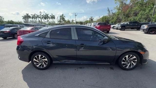 2016 Gray Honda Civic Sedan (19XFC2F70GE) with an 4 2.0 L engine, Variable transmission, located at 27610 S Dixie Hwy, Homestead, FL, 33032, (305) 749-2348, 25.510241, -80.438301 - IIHS Top Safety Pick+. Only 98,630 Miles! Scores 41 Highway MPG and 31 City MPG! This Honda Civic Sedan delivers a Regular Unleaded I-4 2.0 L/122 engine powering this Variable transmission. Window Grid Antenna, Wheels: 16 Alloy, Wheels w/Silver Accents.* This Honda Civic Sedan Features the Following- Photo#5