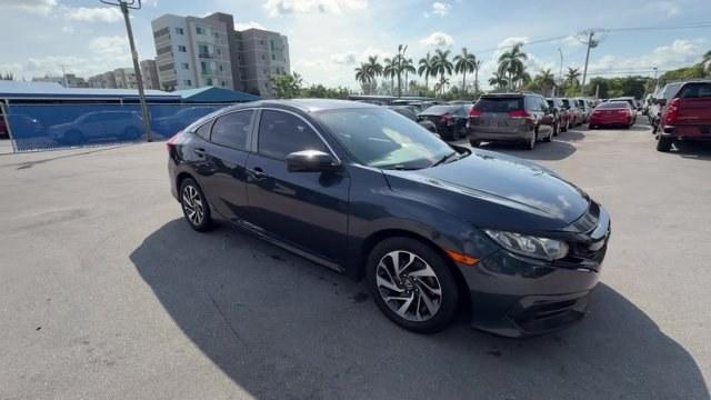 2016 Gray Honda Civic Sedan (19XFC2F70GE) with an 4 2.0 L engine, Variable transmission, located at 27610 S Dixie Hwy, Homestead, FL, 33032, (305) 749-2348, 25.510241, -80.438301 - IIHS Top Safety Pick+. Only 98,630 Miles! Scores 41 Highway MPG and 31 City MPG! This Honda Civic Sedan delivers a Regular Unleaded I-4 2.0 L/122 engine powering this Variable transmission. Window Grid Antenna, Wheels: 16 Alloy, Wheels w/Silver Accents.* This Honda Civic Sedan Features the Following- Photo#6