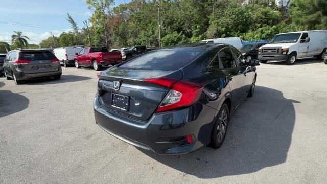 2016 Gray Honda Civic Sedan (19XFC2F70GE) with an 4 2.0 L engine, Variable transmission, located at 27610 S Dixie Hwy, Homestead, FL, 33032, (305) 749-2348, 25.510241, -80.438301 - IIHS Top Safety Pick+. Only 98,630 Miles! Scores 41 Highway MPG and 31 City MPG! This Honda Civic Sedan delivers a Regular Unleaded I-4 2.0 L/122 engine powering this Variable transmission. Window Grid Antenna, Wheels: 16 Alloy, Wheels w/Silver Accents.* This Honda Civic Sedan Features the Following- Photo#16