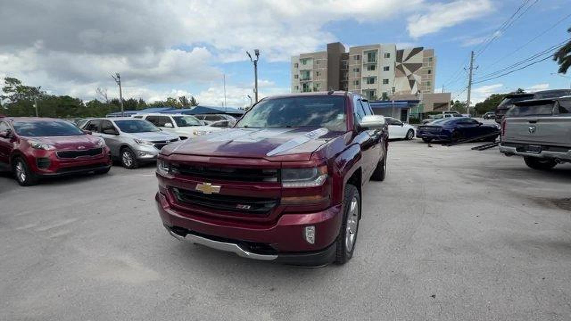 2016 Siren Red Tintcoat /Jet Black Chevrolet Silverado 1500 (1GCVKREC7GZ) with an 8 5.3L engine, Automatic transmission, located at 27610 S Dixie Hwy, Homestead, FL, 33032, (305) 749-2348, 25.510241, -80.438301 - Only 103,267 Miles! Scores 22 Highway MPG and 16 City MPG! This Chevrolet Silverado 1500 delivers a Gas V8 5.3L/325 engine powering this Automatic transmission. WHEELS, 18 X 8.5 (45.7 CM X 21.6 CM) BRIGHT-MACHINED ALUMINUM (STD), TRANSMISSION, 6-SPEED AUTOMATIC, ELECTRONICALLY CONTROLLED with overdr - Photo#0