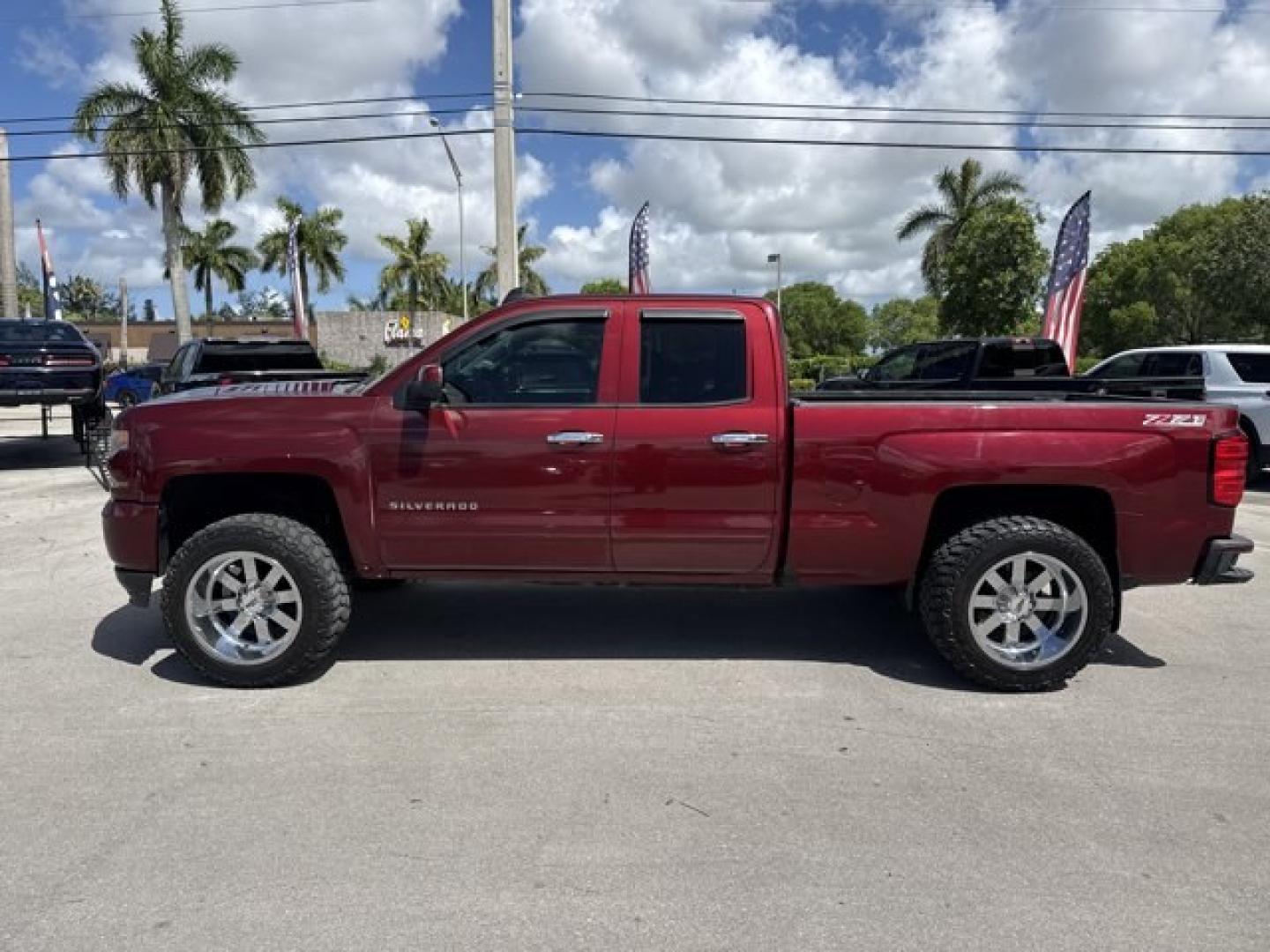 2016 Siren Red Tintcoat /Jet Black Chevrolet Silverado 1500 (1GCVKREC7GZ) with an 8 5.3L engine, Automatic transmission, located at 27610 S Dixie Hwy, Homestead, FL, 33032, (305) 749-2348, 25.510241, -80.438301 - Only 103,267 Miles! Scores 22 Highway MPG and 16 City MPG! This Chevrolet Silverado 1500 delivers a Gas V8 5.3L/325 engine powering this Automatic transmission. WHEELS, 18 X 8.5 (45.7 CM X 21.6 CM) BRIGHT-MACHINED ALUMINUM (STD), TRANSMISSION, 6-SPEED AUTOMATIC, ELECTRONICALLY CONTROLLED with overdr- Photo#1