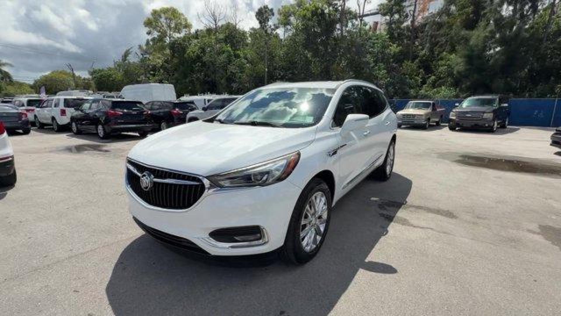 2019 Summit White /Brandy Buick Enclave (5GAERBKW9KJ) with an 6 3.6L engine, Automatic transmission, located at 27610 S Dixie Hwy, Homestead, FL, 33032, (305) 749-2348, 25.510241, -80.438301 - Delivers 26 Highway MPG and 18 City MPG! This Buick Enclave boasts a Gas V6 3.6L/217 engine powering this Automatic transmission. TRANSMISSION, 9-SPEED AUTOMATIC (STD), SEATS, FRONT BUCKETS (STD), ENGINE, 3.6L V6, SIDI, VVT STOP/START (310 hp [231 kW] @ 6800 rpm, 266 lb-ft of torque [359 N-m] @ 2800 - Photo#0