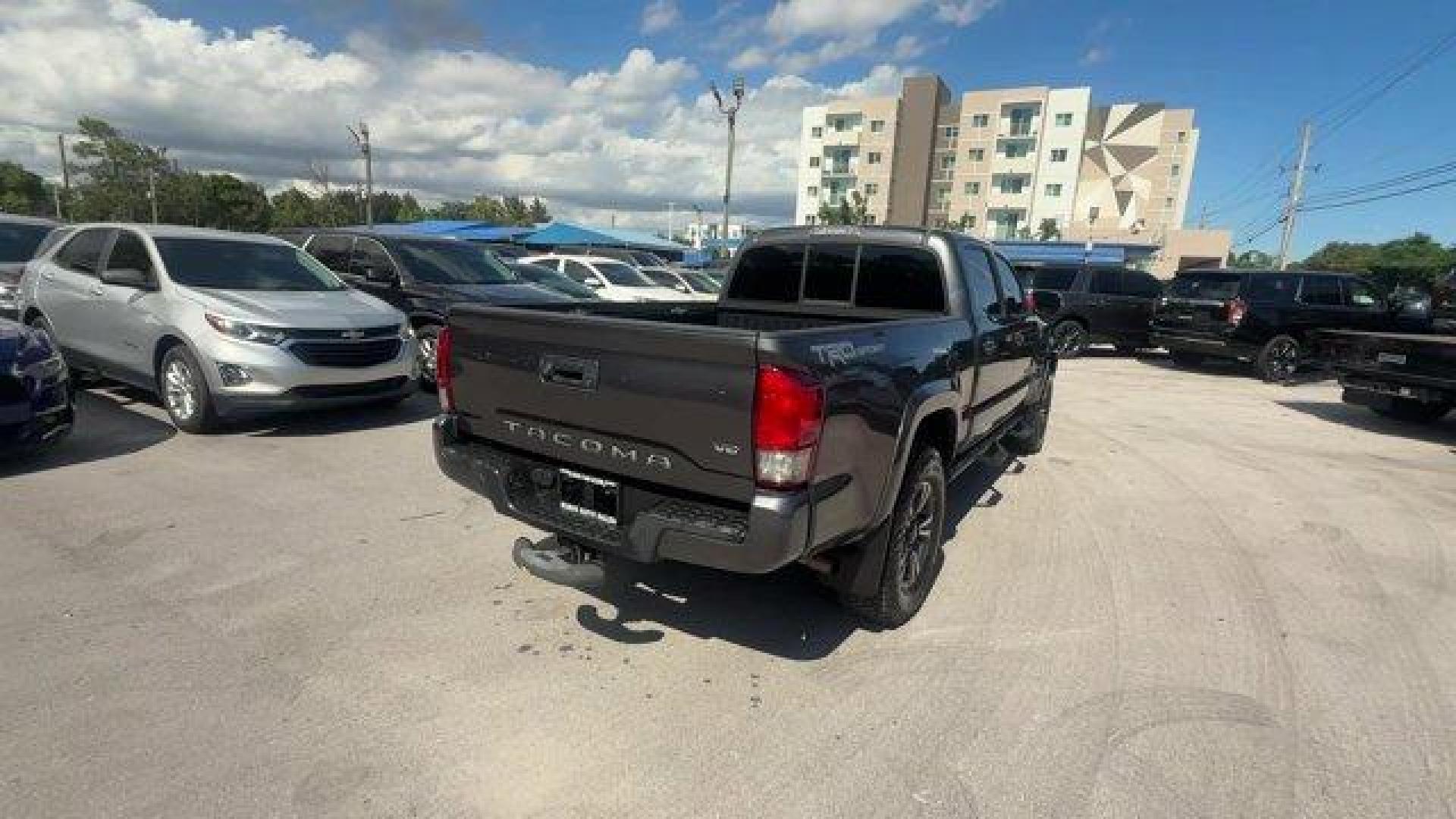 2016 Gray Toyota Tacoma (3TMBZ5DN9GM) with an 6 3.5 L engine, Automatic transmission, located at 27610 S Dixie Hwy, Homestead, FL, 33032, (305) 749-2348, 25.510241, -80.438301 - KBB.com Best Buy Awards Finalist. Scores 24 Highway MPG and 19 City MPG! This Toyota Tacoma delivers a Regular Unleaded V-6 3.5 L/211 engine powering this Automatic transmission. Variable Intermittent Wipers, Trip Computer, Transmission: 6-Speed Automatic -inc: electronic shift and gated shifter.* T - Photo#4