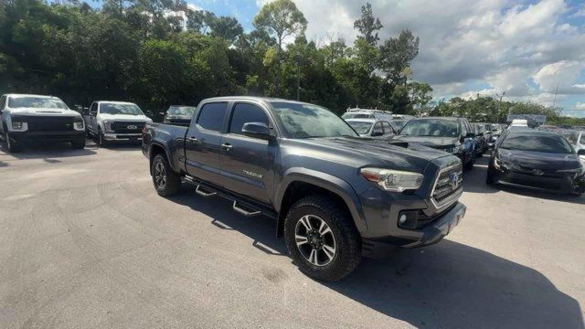 2016 Gray Toyota Tacoma (3TMBZ5DN9GM) with an 6 3.5 L engine, Automatic transmission, located at 27610 S Dixie Hwy, Homestead, FL, 33032, (305) 749-2348, 25.510241, -80.438301 - KBB.com Best Buy Awards Finalist. Scores 24 Highway MPG and 19 City MPG! This Toyota Tacoma delivers a Regular Unleaded V-6 3.5 L/211 engine powering this Automatic transmission. Variable Intermittent Wipers, Trip Computer, Transmission: 6-Speed Automatic -inc: electronic shift and gated shifter.* T - Photo#6