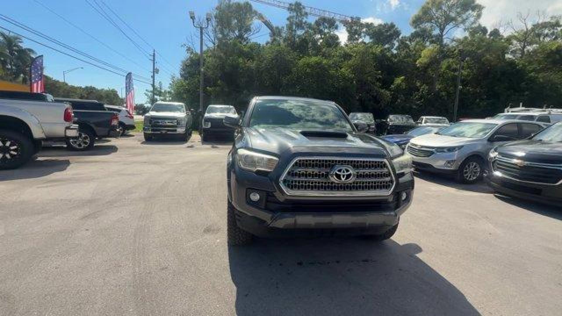 2016 Gray Toyota Tacoma (3TMBZ5DN9GM) with an 6 3.5 L engine, Automatic transmission, located at 27610 S Dixie Hwy, Homestead, FL, 33032, (305) 749-2348, 25.510241, -80.438301 - KBB.com Best Buy Awards Finalist. Scores 24 Highway MPG and 19 City MPG! This Toyota Tacoma delivers a Regular Unleaded V-6 3.5 L/211 engine powering this Automatic transmission. Variable Intermittent Wipers, Trip Computer, Transmission: 6-Speed Automatic -inc: electronic shift and gated shifter.* T - Photo#7