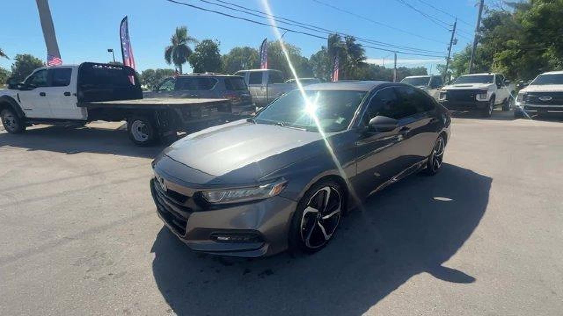 2018 Gray Honda Accord Sedan (1HGCV2F37JA) with an 4 2.0 L engine, Automatic transmission, located at 27610 S Dixie Hwy, Homestead, FL, 33032, (305) 749-2348, 25.510241, -80.438301 - ALG Residual Value Awards, Residual Value Awards. Delivers 32 Highway MPG and 22 City MPG! This Honda Accord Sedan delivers a Intercooled Turbo Regular Unleaded I-4 2.0 L/122 engine powering this Automatic transmission. Wheels: 19 Machine-Finished Alloy w/Black Inserts, VSA Electronic Stability Cont - Photo#0