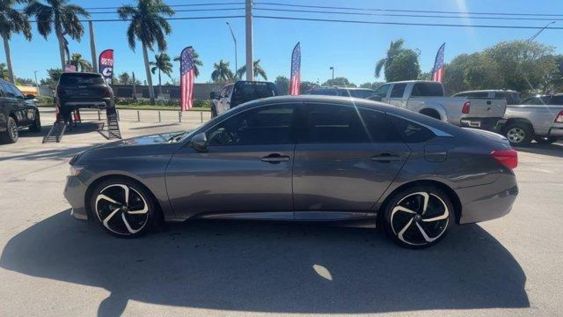 2018 Gray Honda Accord Sedan (1HGCV2F37JA) with an 4 2.0 L engine, Automatic transmission, located at 27610 S Dixie Hwy, Homestead, FL, 33032, (305) 749-2348, 25.510241, -80.438301 - ALG Residual Value Awards, Residual Value Awards. Delivers 32 Highway MPG and 22 City MPG! This Honda Accord Sedan delivers a Intercooled Turbo Regular Unleaded I-4 2.0 L/122 engine powering this Automatic transmission. Wheels: 19 Machine-Finished Alloy w/Black Inserts, VSA Electronic Stability Cont - Photo#1
