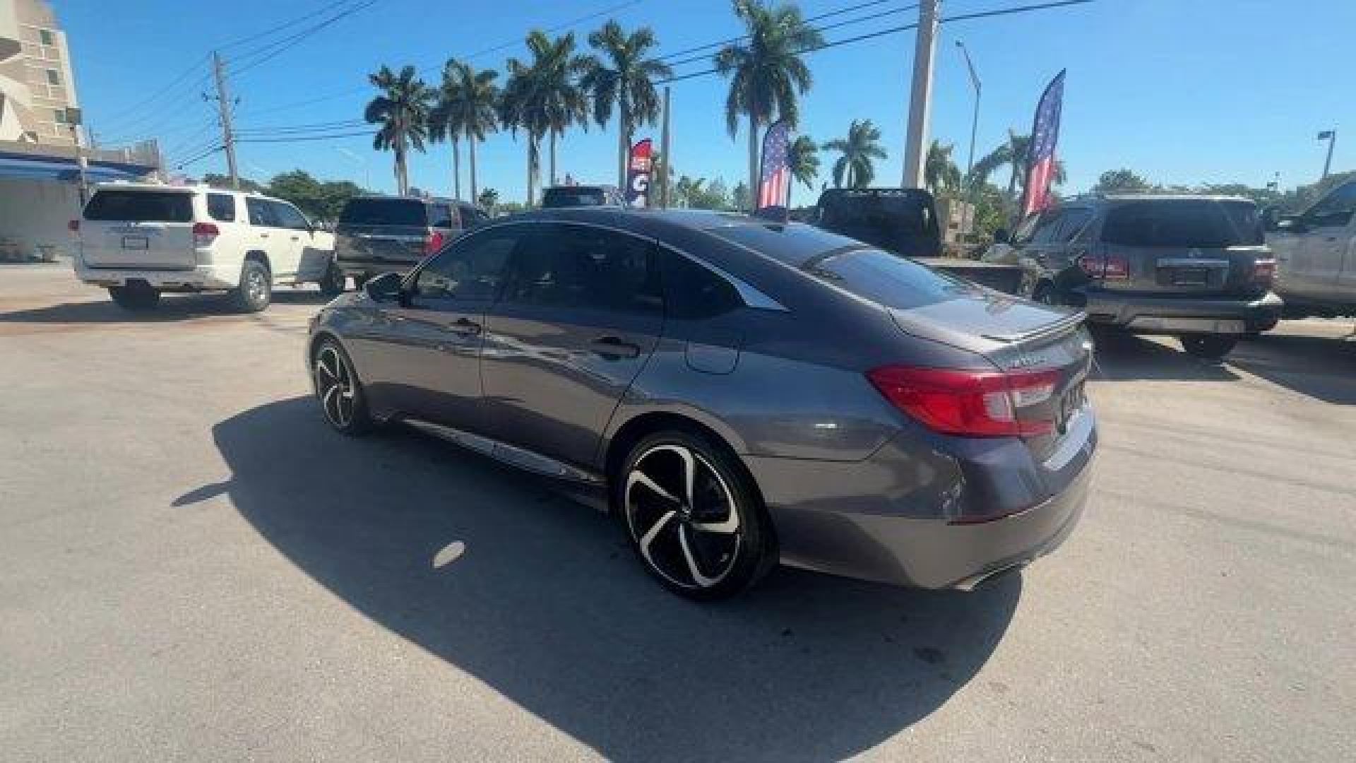 2018 Gray Honda Accord Sedan (1HGCV2F37JA) with an 4 2.0 L engine, Automatic transmission, located at 27610 S Dixie Hwy, Homestead, FL, 33032, (305) 749-2348, 25.510241, -80.438301 - ALG Residual Value Awards, Residual Value Awards. Delivers 32 Highway MPG and 22 City MPG! This Honda Accord Sedan delivers a Intercooled Turbo Regular Unleaded I-4 2.0 L/122 engine powering this Automatic transmission. Wheels: 19 Machine-Finished Alloy w/Black Inserts, VSA Electronic Stability Cont - Photo#2