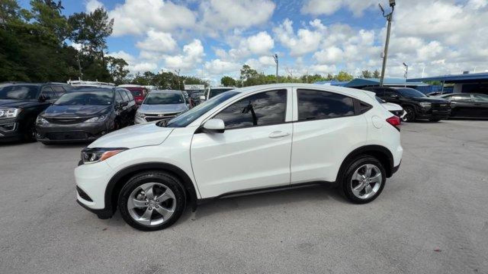 2021 White Honda HR-V (3CZRU6H36MM) with an 4 1.8 L engine, Variable transmission, located at 27610 S Dixie Hwy, Homestead, FL, 33032, (305) 749-2348, 25.510241, -80.438301 - Delivers 31 Highway MPG and 27 City MPG! This Honda HR-V boasts a Regular Unleaded I-4 1.8 L/110 engine powering this Variable transmission. Wireless Phone Connectivity, Wheels: 17 Silver-Painted Alloy, Vehicle Stability Assist (VSA) Electronic Stability Control (ESC).* This Honda HR-V Features the - Photo#1