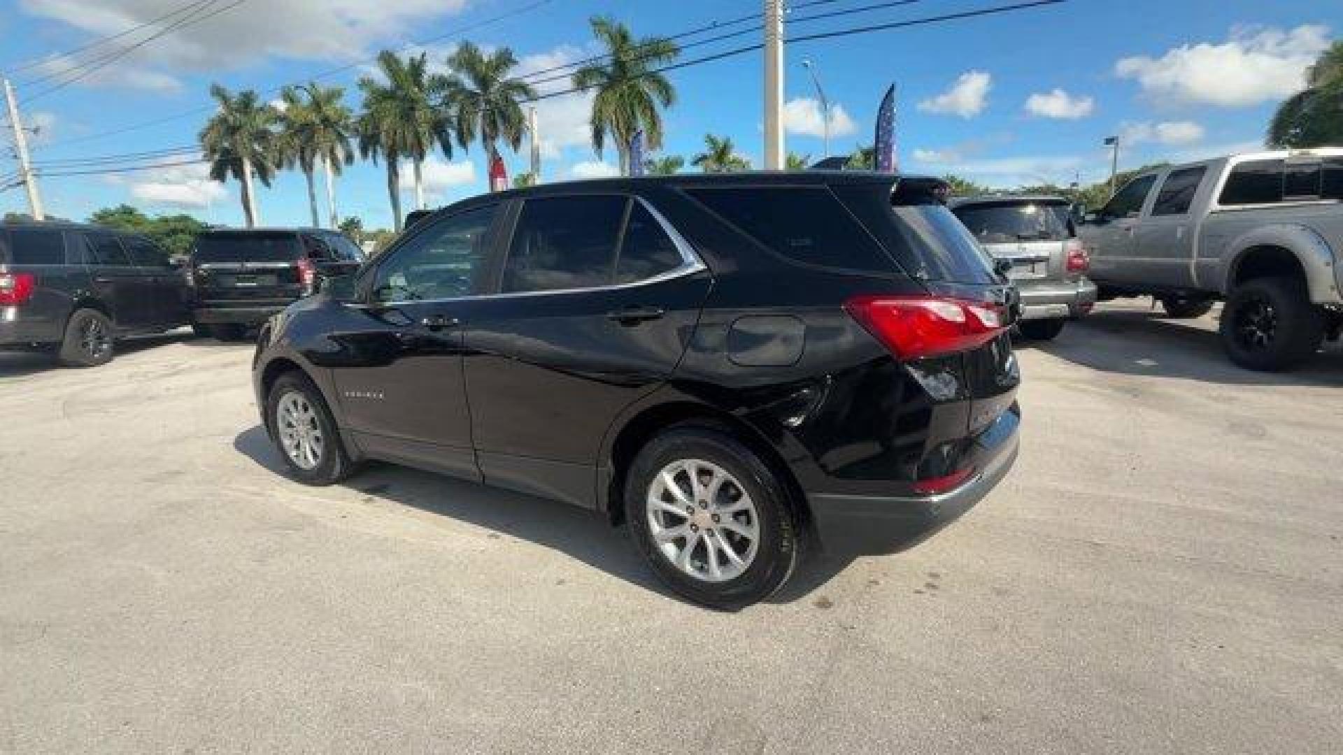 2021 Mosaic Black Metallic /Jet Black Chevrolet Equinox (2GNAXUEV1M6) with an 4 1.5L engine, Automatic transmission, located at 27610 S Dixie Hwy, Homestead, FL, 33032, (305) 749-2348, 25.510241, -80.438301 - IIHS Top Safety Pick with specific headlights. Boasts 30 Highway MPG and 25 City MPG! This Chevrolet Equinox boasts a Turbocharged Gas I4 1.5L/92 engine powering this Automatic transmission. WHEELS, 17 (43.2 CM) ALUMINUM (STD), UNIVERSAL HOME REMOTE includes garage door opener, programmable, TRANSMI - Photo#2