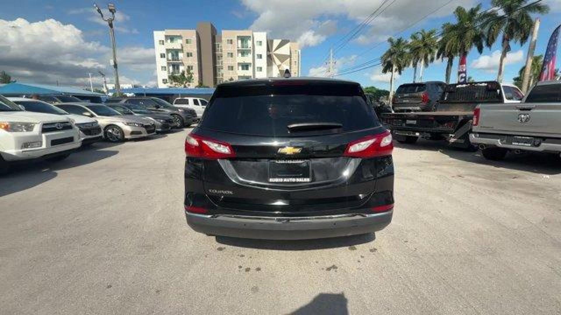 2021 Mosaic Black Metallic /Jet Black Chevrolet Equinox (2GNAXUEV1M6) with an 4 1.5L engine, Automatic transmission, located at 27610 S Dixie Hwy, Homestead, FL, 33032, (305) 749-2348, 25.510241, -80.438301 - IIHS Top Safety Pick with specific headlights. Boasts 30 Highway MPG and 25 City MPG! This Chevrolet Equinox boasts a Turbocharged Gas I4 1.5L/92 engine powering this Automatic transmission. WHEELS, 17 (43.2 CM) ALUMINUM (STD), UNIVERSAL HOME REMOTE includes garage door opener, programmable, TRANSMI - Photo#3