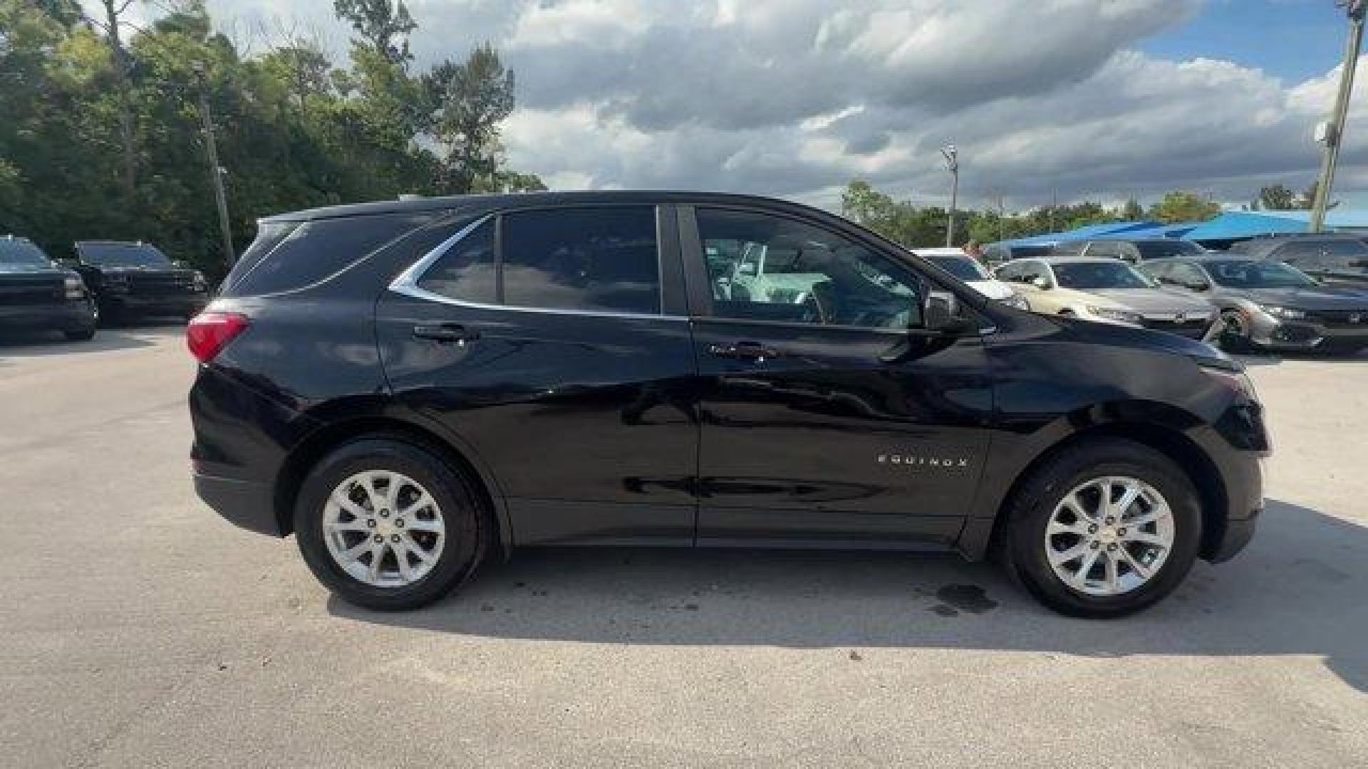 2021 Mosaic Black Metallic /Jet Black Chevrolet Equinox (2GNAXUEV1M6) with an 4 1.5L engine, Automatic transmission, located at 27610 S Dixie Hwy, Homestead, FL, 33032, (305) 749-2348, 25.510241, -80.438301 - IIHS Top Safety Pick with specific headlights. Boasts 30 Highway MPG and 25 City MPG! This Chevrolet Equinox boasts a Turbocharged Gas I4 1.5L/92 engine powering this Automatic transmission. WHEELS, 17 (43.2 CM) ALUMINUM (STD), UNIVERSAL HOME REMOTE includes garage door opener, programmable, TRANSMI - Photo#5