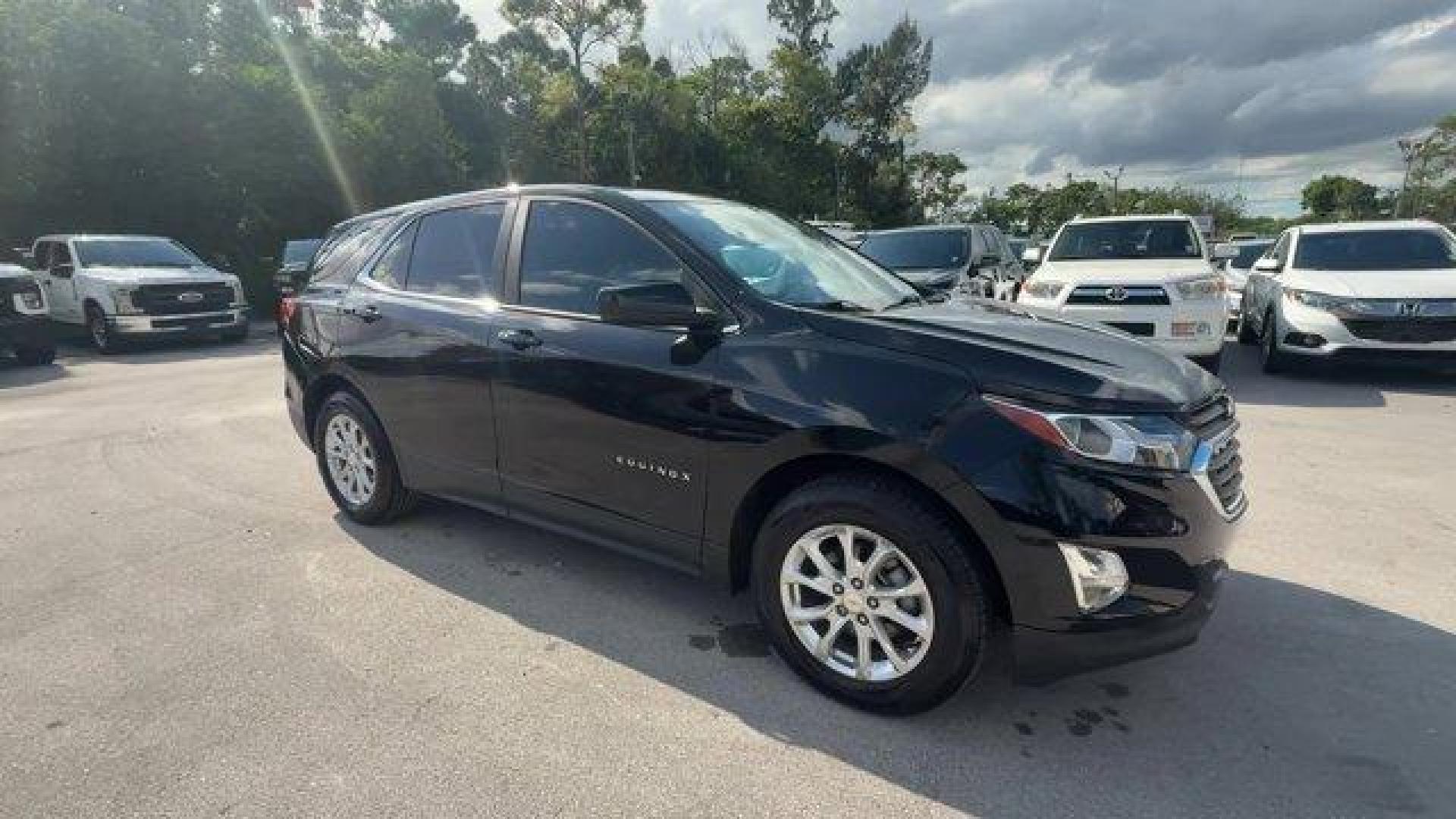 2021 Mosaic Black Metallic /Jet Black Chevrolet Equinox (2GNAXUEV1M6) with an 4 1.5L engine, Automatic transmission, located at 27610 S Dixie Hwy, Homestead, FL, 33032, (305) 749-2348, 25.510241, -80.438301 - IIHS Top Safety Pick with specific headlights. Boasts 30 Highway MPG and 25 City MPG! This Chevrolet Equinox boasts a Turbocharged Gas I4 1.5L/92 engine powering this Automatic transmission. WHEELS, 17 (43.2 CM) ALUMINUM (STD), UNIVERSAL HOME REMOTE includes garage door opener, programmable, TRANSMI - Photo#6