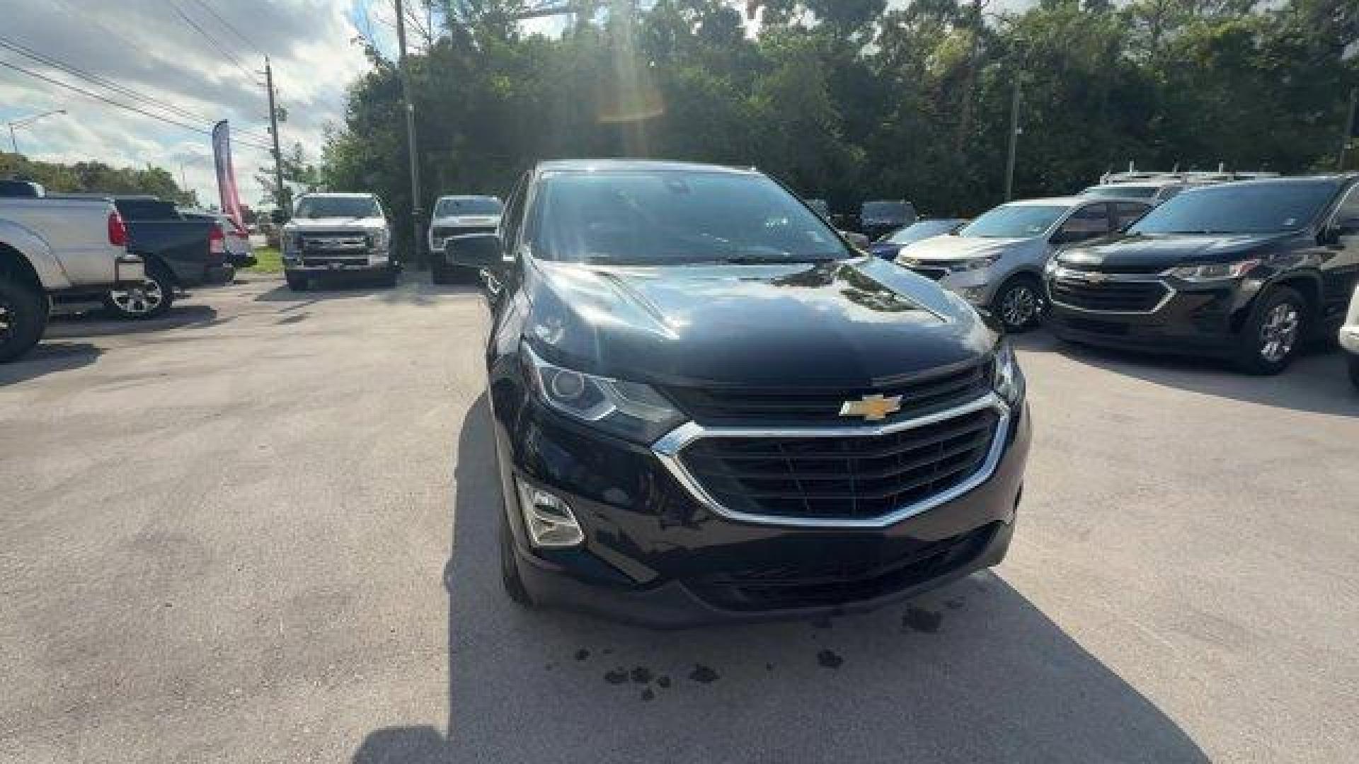 2021 Mosaic Black Metallic /Jet Black Chevrolet Equinox (2GNAXUEV1M6) with an 4 1.5L engine, Automatic transmission, located at 27610 S Dixie Hwy, Homestead, FL, 33032, (305) 749-2348, 25.510241, -80.438301 - IIHS Top Safety Pick with specific headlights. Boasts 30 Highway MPG and 25 City MPG! This Chevrolet Equinox boasts a Turbocharged Gas I4 1.5L/92 engine powering this Automatic transmission. WHEELS, 17 (43.2 CM) ALUMINUM (STD), UNIVERSAL HOME REMOTE includes garage door opener, programmable, TRANSMI - Photo#7