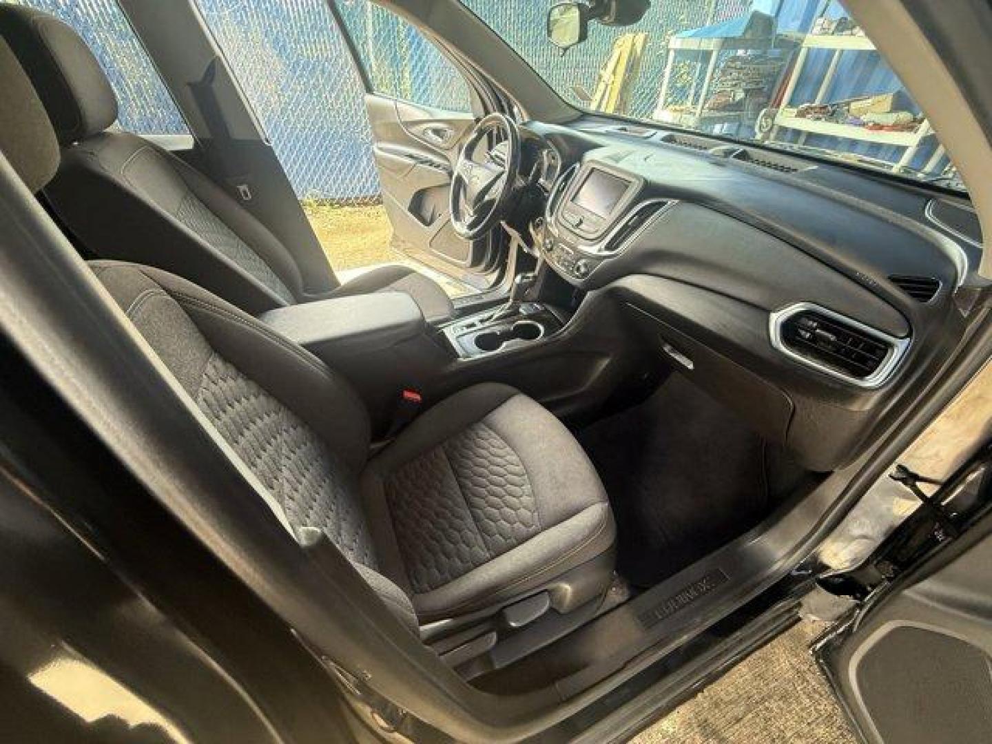 2021 Mosaic Black Metallic /Jet Black Chevrolet Equinox (2GNAXUEV1M6) with an 4 1.5L engine, Automatic transmission, located at 27610 S Dixie Hwy, Homestead, FL, 33032, (305) 749-2348, 25.510241, -80.438301 - IIHS Top Safety Pick with specific headlights. Boasts 30 Highway MPG and 25 City MPG! This Chevrolet Equinox boasts a Turbocharged Gas I4 1.5L/92 engine powering this Automatic transmission. WHEELS, 17 (43.2 CM) ALUMINUM (STD), UNIVERSAL HOME REMOTE includes garage door opener, programmable, TRANSMI - Photo#10