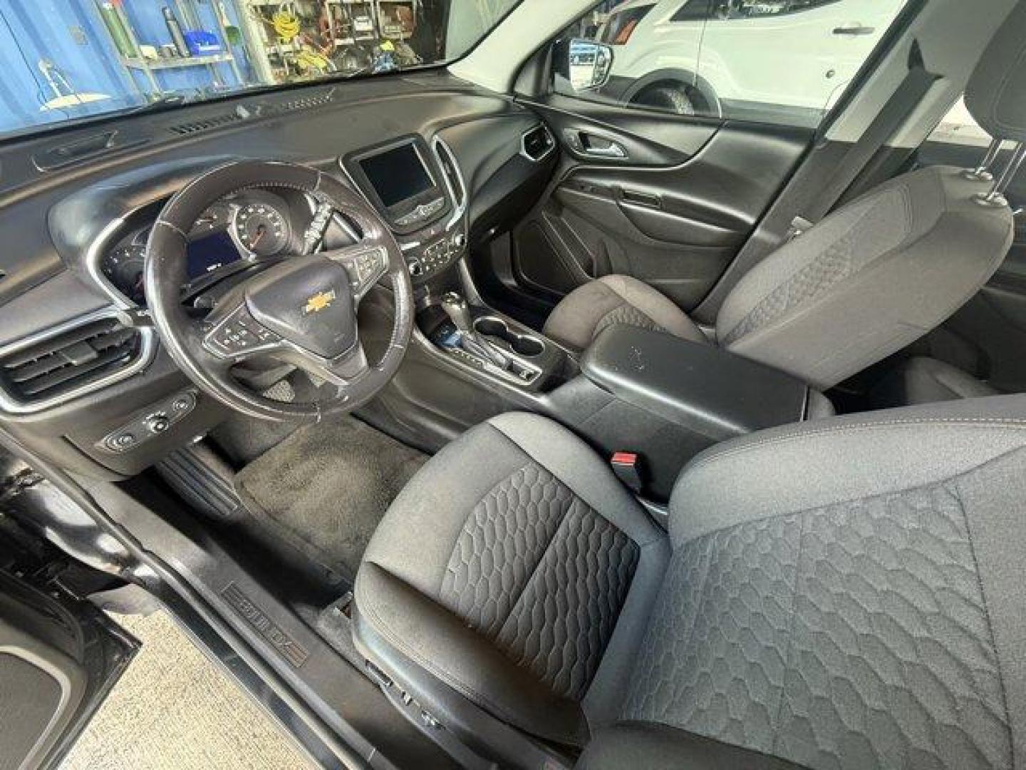 2021 Mosaic Black Metallic /Jet Black Chevrolet Equinox (2GNAXUEV1M6) with an 4 1.5L engine, Automatic transmission, located at 27610 S Dixie Hwy, Homestead, FL, 33032, (305) 749-2348, 25.510241, -80.438301 - IIHS Top Safety Pick with specific headlights. Boasts 30 Highway MPG and 25 City MPG! This Chevrolet Equinox boasts a Turbocharged Gas I4 1.5L/92 engine powering this Automatic transmission. WHEELS, 17 (43.2 CM) ALUMINUM (STD), UNIVERSAL HOME REMOTE includes garage door opener, programmable, TRANSMI - Photo#12