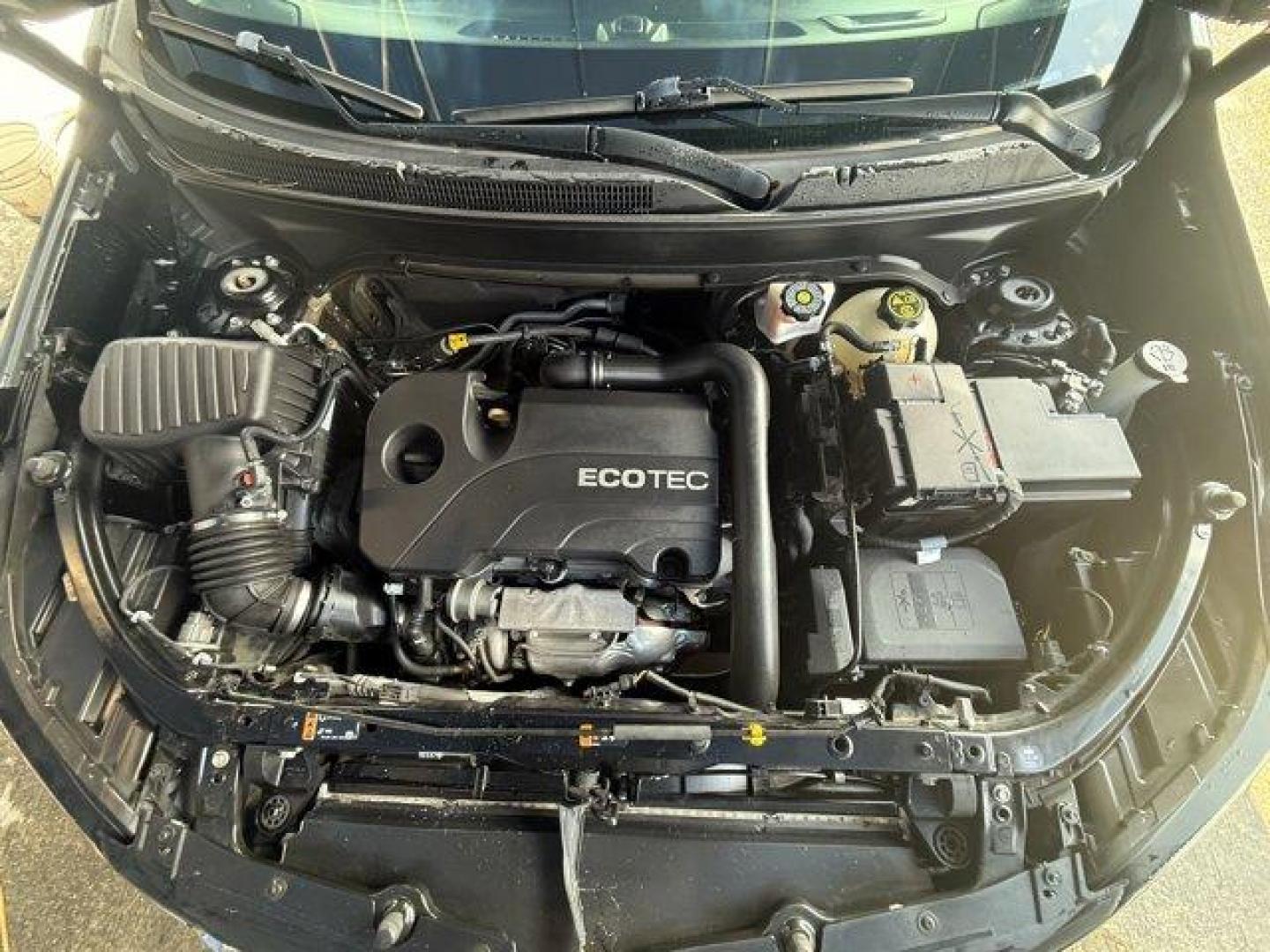 2021 Mosaic Black Metallic /Jet Black Chevrolet Equinox (2GNAXUEV1M6) with an 4 1.5L engine, Automatic transmission, located at 27610 S Dixie Hwy, Homestead, FL, 33032, (305) 749-2348, 25.510241, -80.438301 - IIHS Top Safety Pick with specific headlights. Boasts 30 Highway MPG and 25 City MPG! This Chevrolet Equinox boasts a Turbocharged Gas I4 1.5L/92 engine powering this Automatic transmission. WHEELS, 17 (43.2 CM) ALUMINUM (STD), UNIVERSAL HOME REMOTE includes garage door opener, programmable, TRANSMI - Photo#16