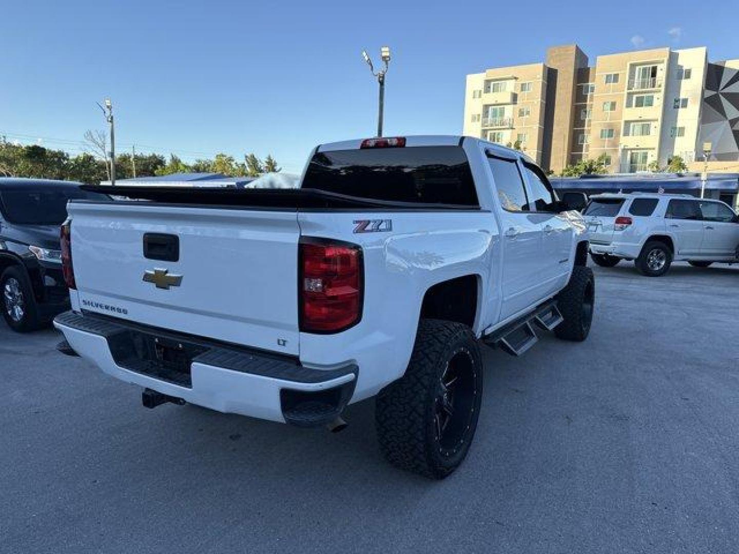 2018 Summit White /Jet Black Chevrolet Silverado 1500 (3GCUKREC0JG) with an 8 5.3L engine, Automatic transmission, located at 27610 S Dixie Hwy, Homestead, FL, 33032, (305) 749-2348, 25.510241, -80.438301 - KBB.com 10 Most Awarded Brands. Boasts 22 Highway MPG and 16 City MPG! This Chevrolet Silverado 1500 boasts a Gas V8 5.3L/325 engine powering this Automatic transmission. WIRELESS CHARGING, WHEELS, 18 X 8.5 (45.7 CM X 21.6 CM) BRIGHT-MACHINED ALUMINUM (STD), WHEEL, FULL-SIZE SPARE, 17 (43.2 CM) STEE - Photo#4