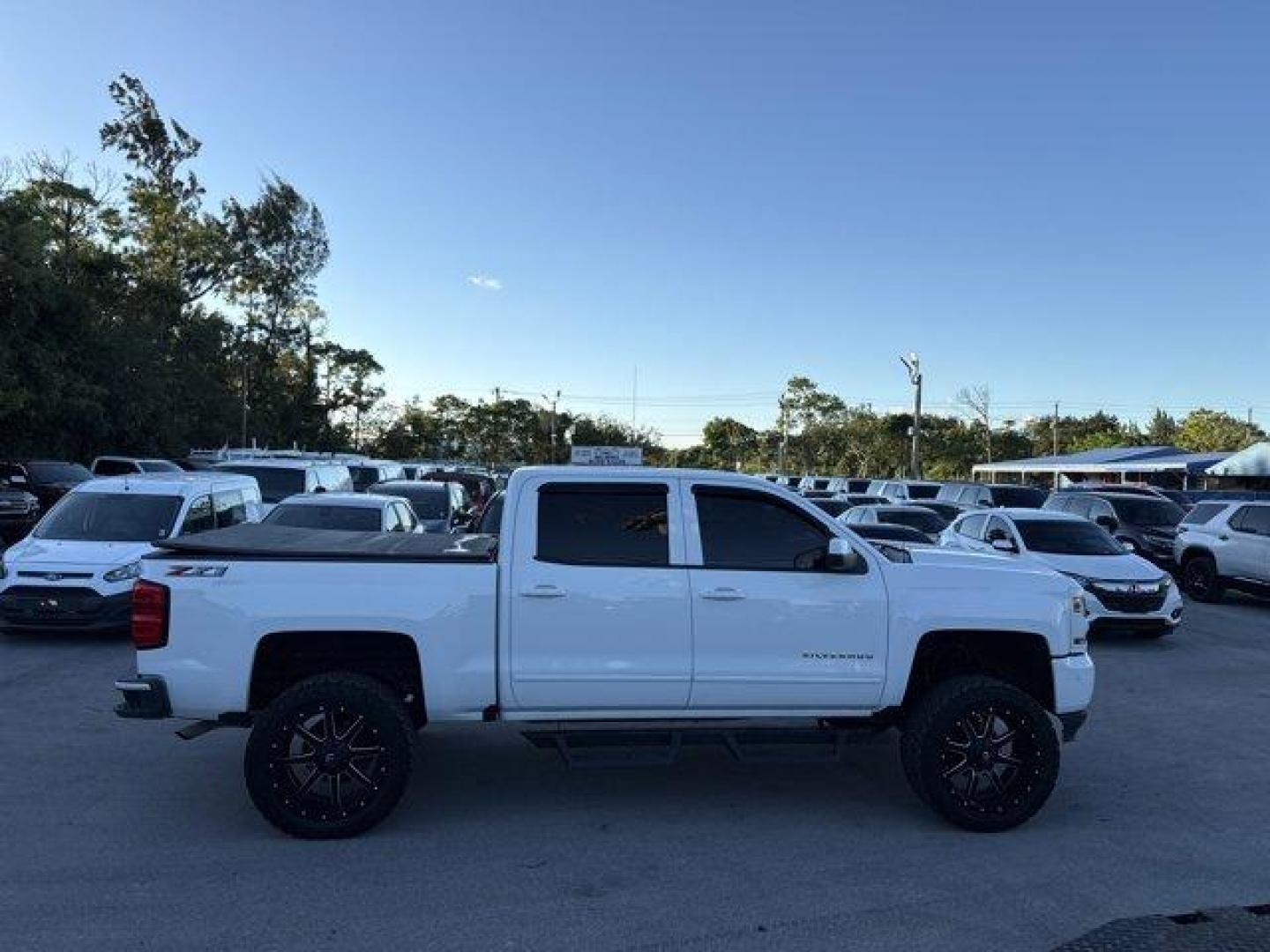2018 Summit White /Jet Black Chevrolet Silverado 1500 (3GCUKREC0JG) with an 8 5.3L engine, Automatic transmission, located at 27610 S Dixie Hwy, Homestead, FL, 33032, (305) 749-2348, 25.510241, -80.438301 - KBB.com 10 Most Awarded Brands. Boasts 22 Highway MPG and 16 City MPG! This Chevrolet Silverado 1500 boasts a Gas V8 5.3L/325 engine powering this Automatic transmission. WIRELESS CHARGING, WHEELS, 18 X 8.5 (45.7 CM X 21.6 CM) BRIGHT-MACHINED ALUMINUM (STD), WHEEL, FULL-SIZE SPARE, 17 (43.2 CM) STEE - Photo#6