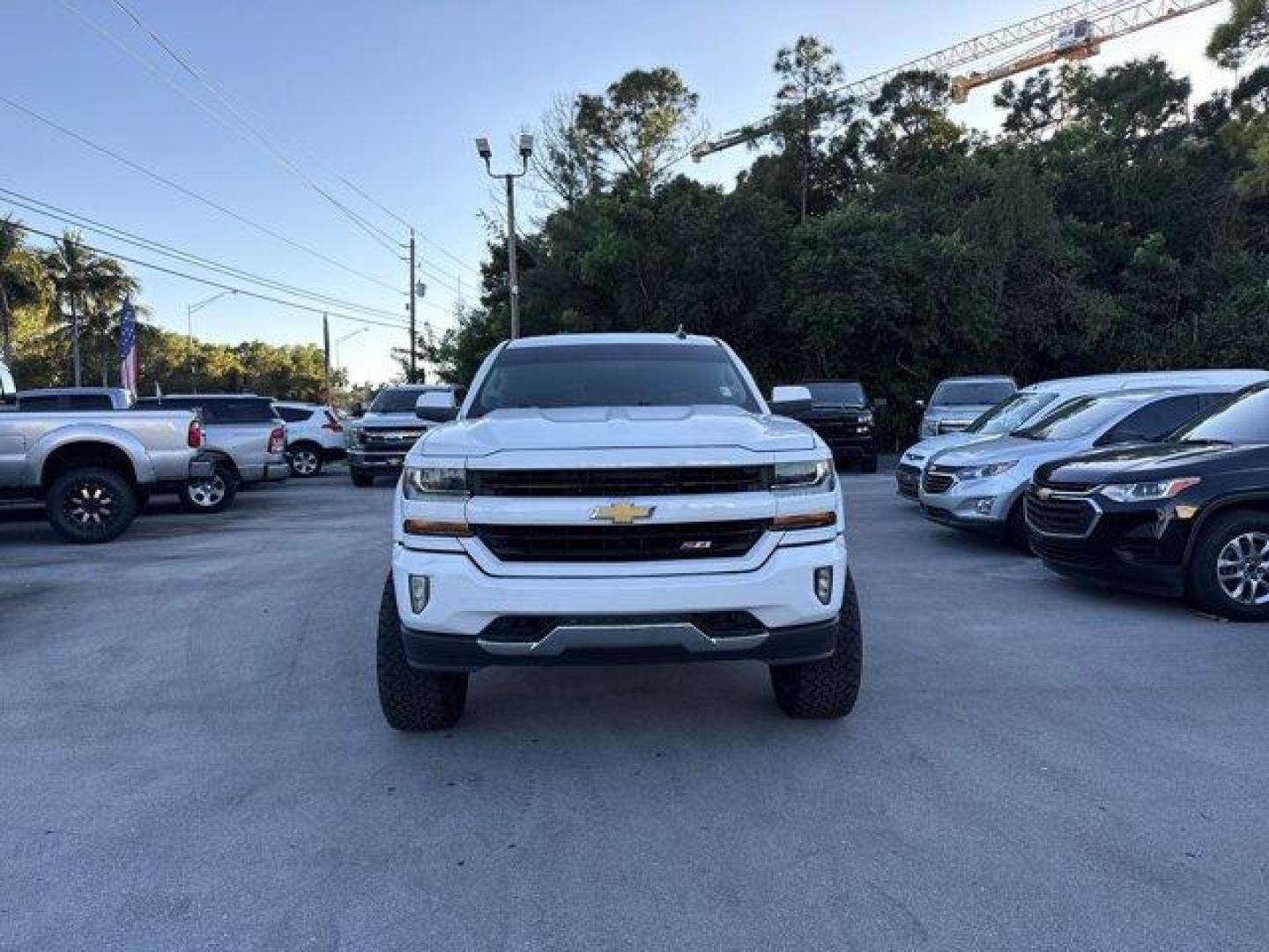 2018 Summit White /Jet Black Chevrolet Silverado 1500 (3GCUKREC0JG) with an 8 5.3L engine, Automatic transmission, located at 27610 S Dixie Hwy, Homestead, FL, 33032, (305) 749-2348, 25.510241, -80.438301 - KBB.com 10 Most Awarded Brands. Boasts 22 Highway MPG and 16 City MPG! This Chevrolet Silverado 1500 boasts a Gas V8 5.3L/325 engine powering this Automatic transmission. WIRELESS CHARGING, WHEELS, 18 X 8.5 (45.7 CM X 21.6 CM) BRIGHT-MACHINED ALUMINUM (STD), WHEEL, FULL-SIZE SPARE, 17 (43.2 CM) STEE - Photo#8