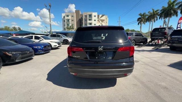 2017 Black Honda Pilot (5FNYF5H80HB) with an 6 3.5 L engine, Automatic transmission, located at 27610 S Dixie Hwy, Homestead, FL, 33032, (305) 749-2348, 25.510241, -80.438301 - IIHS Top Safety Pick+. Delivers 27 Highway MPG and 19 City MPG! This Honda Pilot boasts a Regular Unleaded V-6 3.5 L/212 engine powering this Automatic transmission. Window Grid Antenna, Wheels: 18 Alloy, Wheels w/Machined Accents.*This Honda Pilot Comes Equipped with These Options *VSA Electronic S - Photo#3