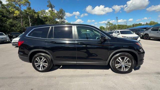 2017 Black Honda Pilot (5FNYF5H80HB) with an 6 3.5 L engine, Automatic transmission, located at 27610 S Dixie Hwy, Homestead, FL, 33032, (305) 749-2348, 25.510241, -80.438301 - IIHS Top Safety Pick+. Delivers 27 Highway MPG and 19 City MPG! This Honda Pilot boasts a Regular Unleaded V-6 3.5 L/212 engine powering this Automatic transmission. Window Grid Antenna, Wheels: 18 Alloy, Wheels w/Machined Accents.*This Honda Pilot Comes Equipped with These Options *VSA Electronic S - Photo#5