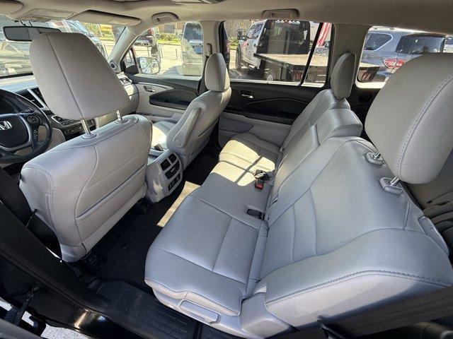 2017 Black Honda Pilot (5FNYF5H80HB) with an 6 3.5 L engine, Automatic transmission, located at 27610 S Dixie Hwy, Homestead, FL, 33032, (305) 749-2348, 25.510241, -80.438301 - IIHS Top Safety Pick+. Delivers 27 Highway MPG and 19 City MPG! This Honda Pilot boasts a Regular Unleaded V-6 3.5 L/212 engine powering this Automatic transmission. Window Grid Antenna, Wheels: 18 Alloy, Wheels w/Machined Accents.*This Honda Pilot Comes Equipped with These Options *VSA Electronic S - Photo#11