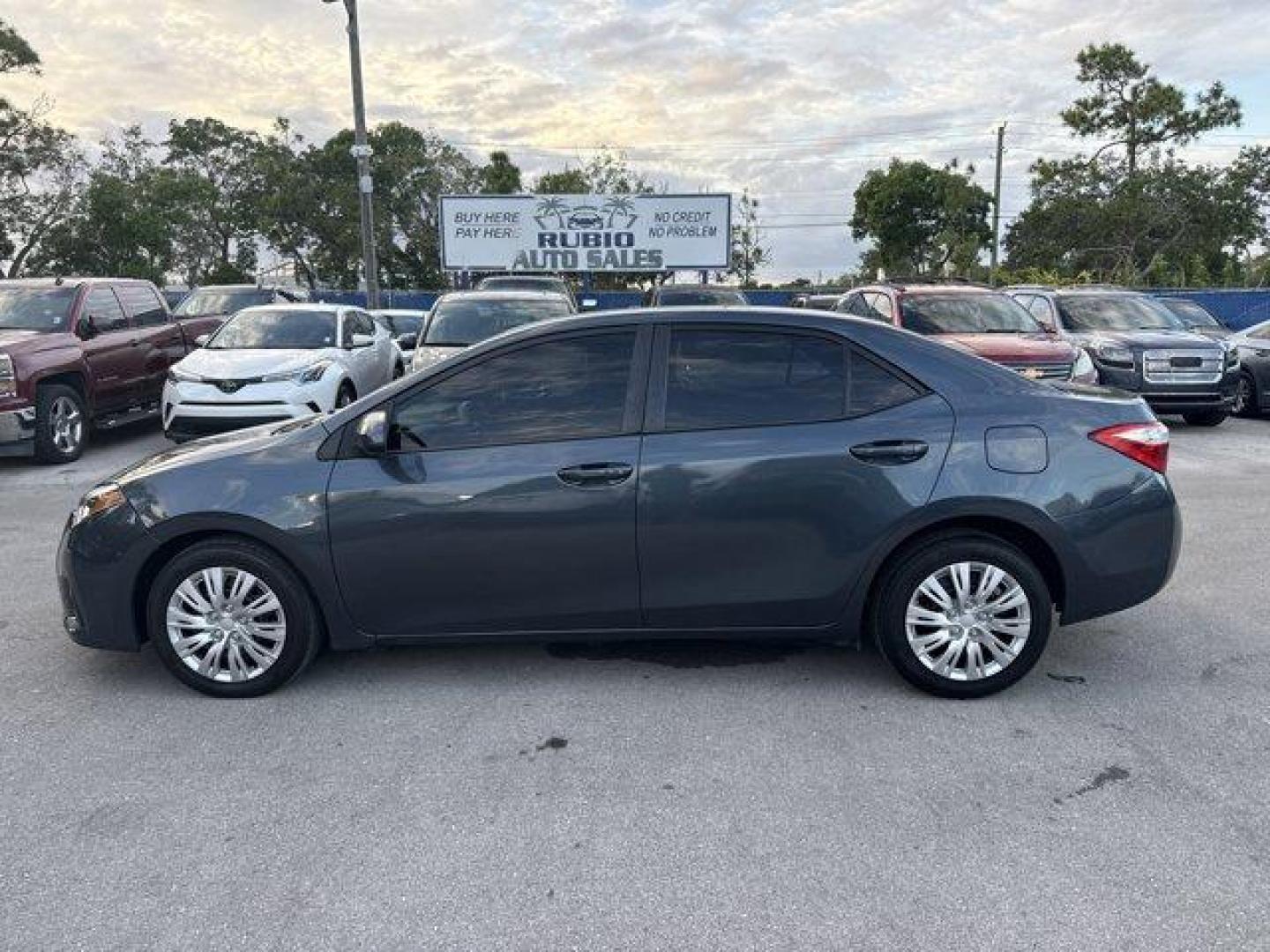 2014 Gray Toyota Corolla (5YFBURHE7EP) with an 4 1.8 L engine, Automatic transmission, located at 27610 S Dixie Hwy, Homestead, FL, 33032, (305) 749-2348, 25.510241, -80.438301 - KBB.com 5-Year Cost to Own Awards. This Toyota Corolla delivers a Regular Unleaded I-4 1.8 L/110 engine powering this Automatic transmission. Window Grid Antenna, Urethane Gear Shifter Material, Trunk Rear Cargo Access.* This Toyota Corolla Features the Following Options *Trip Computer, Torsion Beam - Photo#1