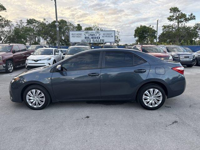 2014 Gray Toyota Corolla (5YFBURHE7EP) with an 4 1.8 L engine, Automatic transmission, located at 27610 S Dixie Hwy, Homestead, FL, 33032, (305) 749-2348, 25.510241, -80.438301 - KBB.com 5-Year Cost to Own Awards. This Toyota Corolla delivers a Regular Unleaded I-4 1.8 L/110 engine powering this Automatic transmission. Window Grid Antenna, Urethane Gear Shifter Material, Trunk Rear Cargo Access.* This Toyota Corolla Features the Following Options *Trip Computer, Torsion Beam - Photo#1