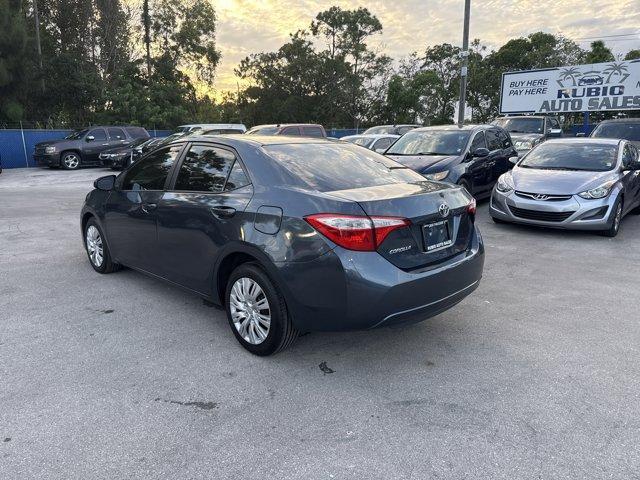 2014 Gray Toyota Corolla (5YFBURHE7EP) with an 4 1.8 L engine, Automatic transmission, located at 27610 S Dixie Hwy, Homestead, FL, 33032, (305) 749-2348, 25.510241, -80.438301 - KBB.com 5-Year Cost to Own Awards. This Toyota Corolla delivers a Regular Unleaded I-4 1.8 L/110 engine powering this Automatic transmission. Window Grid Antenna, Urethane Gear Shifter Material, Trunk Rear Cargo Access.* This Toyota Corolla Features the Following Options *Trip Computer, Torsion Beam - Photo#2
