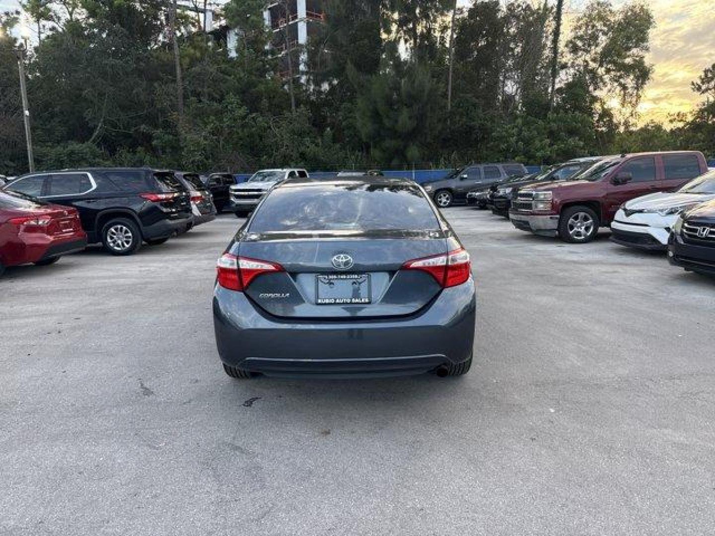 2014 Gray Toyota Corolla (5YFBURHE7EP) with an 4 1.8 L engine, Automatic transmission, located at 27610 S Dixie Hwy, Homestead, FL, 33032, (305) 749-2348, 25.510241, -80.438301 - KBB.com 5-Year Cost to Own Awards. This Toyota Corolla delivers a Regular Unleaded I-4 1.8 L/110 engine powering this Automatic transmission. Window Grid Antenna, Urethane Gear Shifter Material, Trunk Rear Cargo Access.* This Toyota Corolla Features the Following Options *Trip Computer, Torsion Beam - Photo#3