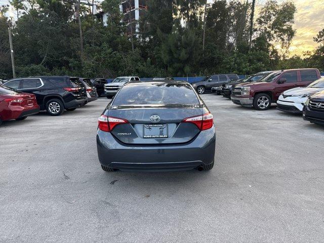 2014 Gray Toyota Corolla (5YFBURHE7EP) with an 4 1.8 L engine, Automatic transmission, located at 27610 S Dixie Hwy, Homestead, FL, 33032, (305) 749-2348, 25.510241, -80.438301 - KBB.com 5-Year Cost to Own Awards. This Toyota Corolla delivers a Regular Unleaded I-4 1.8 L/110 engine powering this Automatic transmission. Window Grid Antenna, Urethane Gear Shifter Material, Trunk Rear Cargo Access.* This Toyota Corolla Features the Following Options *Trip Computer, Torsion Beam - Photo#3
