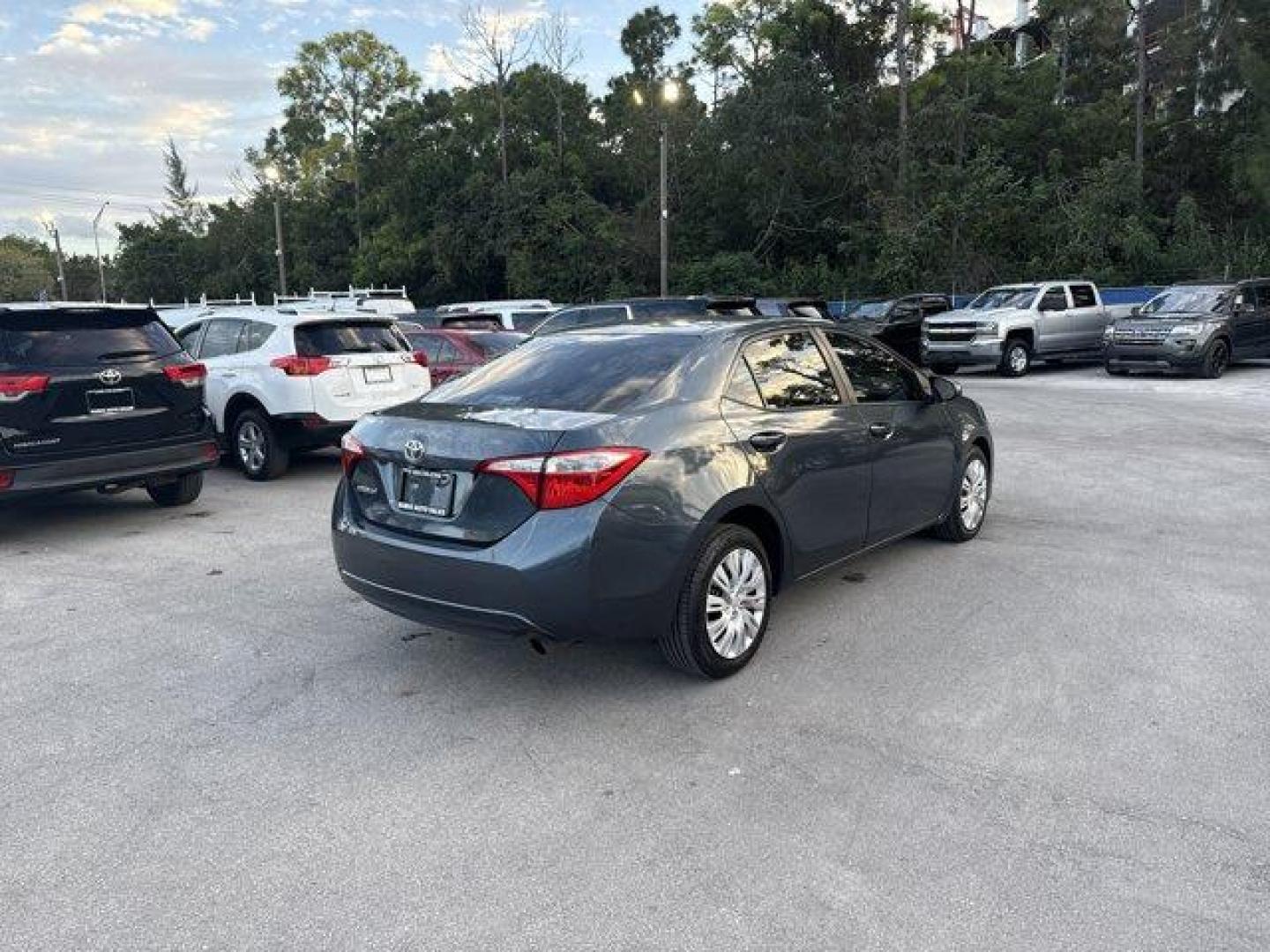 2014 Gray Toyota Corolla (5YFBURHE7EP) with an 4 1.8 L engine, Automatic transmission, located at 27610 S Dixie Hwy, Homestead, FL, 33032, (305) 749-2348, 25.510241, -80.438301 - KBB.com 5-Year Cost to Own Awards. This Toyota Corolla delivers a Regular Unleaded I-4 1.8 L/110 engine powering this Automatic transmission. Window Grid Antenna, Urethane Gear Shifter Material, Trunk Rear Cargo Access.* This Toyota Corolla Features the Following Options *Trip Computer, Torsion Beam - Photo#4