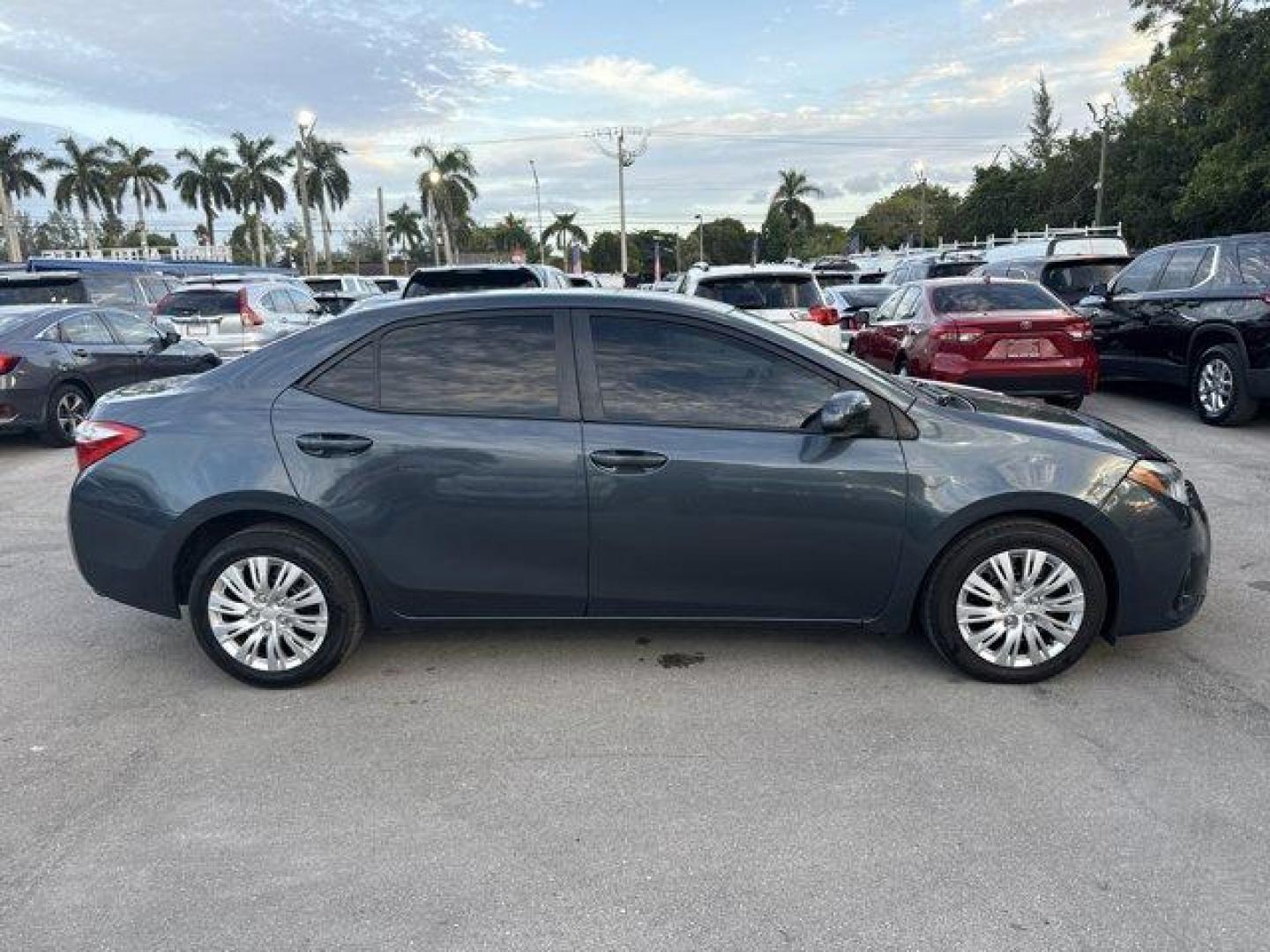 2014 Gray Toyota Corolla (5YFBURHE7EP) with an 4 1.8 L engine, Automatic transmission, located at 27610 S Dixie Hwy, Homestead, FL, 33032, (305) 749-2348, 25.510241, -80.438301 - KBB.com 5-Year Cost to Own Awards. This Toyota Corolla delivers a Regular Unleaded I-4 1.8 L/110 engine powering this Automatic transmission. Window Grid Antenna, Urethane Gear Shifter Material, Trunk Rear Cargo Access.* This Toyota Corolla Features the Following Options *Trip Computer, Torsion Beam - Photo#5