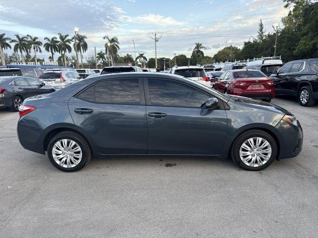 2014 Gray Toyota Corolla (5YFBURHE7EP) with an 4 1.8 L engine, Automatic transmission, located at 27610 S Dixie Hwy, Homestead, FL, 33032, (305) 749-2348, 25.510241, -80.438301 - KBB.com 5-Year Cost to Own Awards. This Toyota Corolla delivers a Regular Unleaded I-4 1.8 L/110 engine powering this Automatic transmission. Window Grid Antenna, Urethane Gear Shifter Material, Trunk Rear Cargo Access.* This Toyota Corolla Features the Following Options *Trip Computer, Torsion Beam - Photo#5