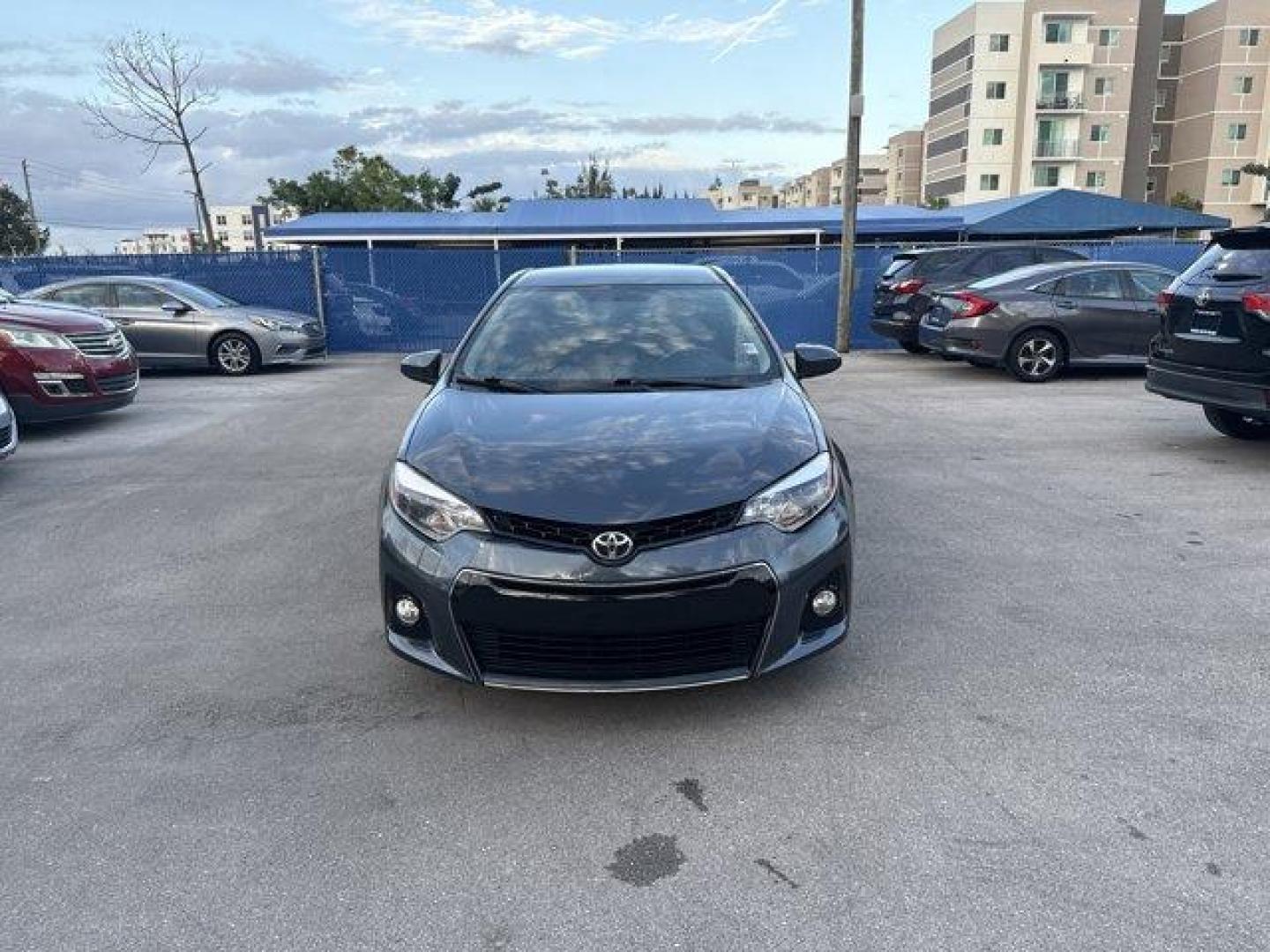 2014 Gray Toyota Corolla (5YFBURHE7EP) with an 4 1.8 L engine, Automatic transmission, located at 27610 S Dixie Hwy, Homestead, FL, 33032, (305) 749-2348, 25.510241, -80.438301 - KBB.com 5-Year Cost to Own Awards. This Toyota Corolla delivers a Regular Unleaded I-4 1.8 L/110 engine powering this Automatic transmission. Window Grid Antenna, Urethane Gear Shifter Material, Trunk Rear Cargo Access.* This Toyota Corolla Features the Following Options *Trip Computer, Torsion Beam - Photo#7
