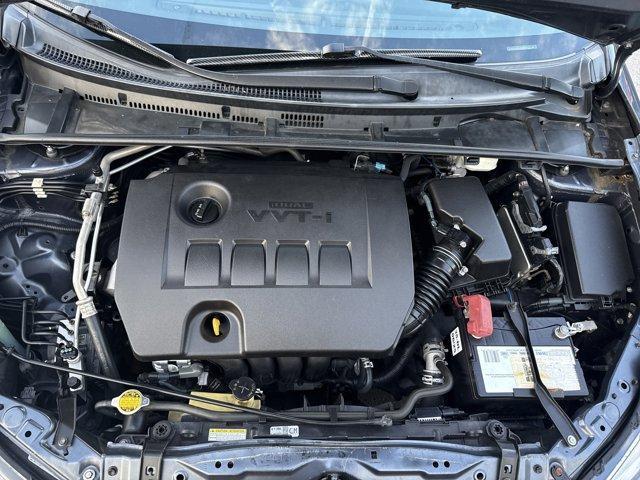 2014 Gray Toyota Corolla (5YFBURHE7EP) with an 4 1.8 L engine, Automatic transmission, located at 27610 S Dixie Hwy, Homestead, FL, 33032, (305) 749-2348, 25.510241, -80.438301 - KBB.com 5-Year Cost to Own Awards. This Toyota Corolla delivers a Regular Unleaded I-4 1.8 L/110 engine powering this Automatic transmission. Window Grid Antenna, Urethane Gear Shifter Material, Trunk Rear Cargo Access.* This Toyota Corolla Features the Following Options *Trip Computer, Torsion Beam - Photo#8