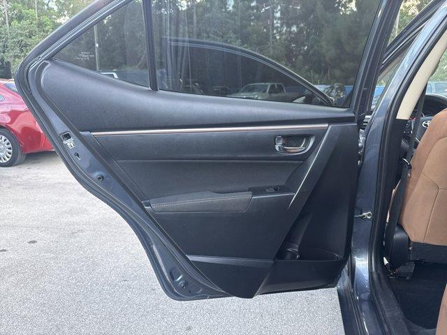 2014 Gray Toyota Corolla (5YFBURHE7EP) with an 4 1.8 L engine, Automatic transmission, located at 27610 S Dixie Hwy, Homestead, FL, 33032, (305) 749-2348, 25.510241, -80.438301 - KBB.com 5-Year Cost to Own Awards. This Toyota Corolla delivers a Regular Unleaded I-4 1.8 L/110 engine powering this Automatic transmission. Window Grid Antenna, Urethane Gear Shifter Material, Trunk Rear Cargo Access.* This Toyota Corolla Features the Following Options *Trip Computer, Torsion Beam - Photo#13