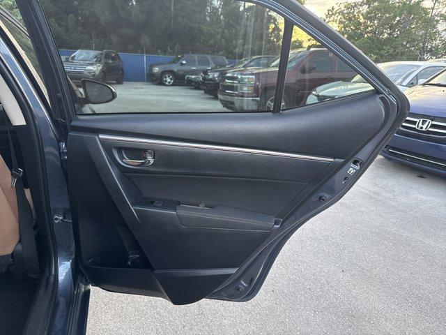2014 Gray Toyota Corolla (5YFBURHE7EP) with an 4 1.8 L engine, Automatic transmission, located at 27610 S Dixie Hwy, Homestead, FL, 33032, (305) 749-2348, 25.510241, -80.438301 - KBB.com 5-Year Cost to Own Awards. This Toyota Corolla delivers a Regular Unleaded I-4 1.8 L/110 engine powering this Automatic transmission. Window Grid Antenna, Urethane Gear Shifter Material, Trunk Rear Cargo Access.* This Toyota Corolla Features the Following Options *Trip Computer, Torsion Beam - Photo#14
