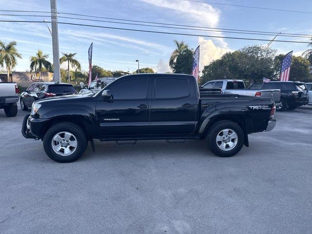 2014 Black Toyota Tacoma (5TFLU4EN0EX) with an 6 4.0 L engine, Automatic transmission, located at 27610 S Dixie Hwy, Homestead, FL, 33032, (305) 749-2348, 25.510241, -80.438301 - KBB.com Best Resale Value Awards. Only 56,851 Miles! Boasts 21 Highway MPG and 16 City MPG! This Toyota Tacoma boasts a Regular Unleaded V-6 4.0 L/241 engine powering this Automatic transmission. Wheels: 16 x 7J+30 Style Steel, Urethane Gear Shifter Material, Transmission: 5-Speed Automatic w/ECT-i. - Photo#1