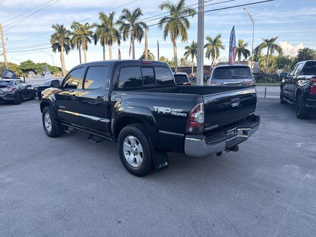 2014 Black Toyota Tacoma (5TFLU4EN0EX) with an 6 4.0 L engine, Automatic transmission, located at 27610 S Dixie Hwy, Homestead, FL, 33032, (305) 749-2348, 25.510241, -80.438301 - KBB.com Best Resale Value Awards. Only 56,851 Miles! Boasts 21 Highway MPG and 16 City MPG! This Toyota Tacoma boasts a Regular Unleaded V-6 4.0 L/241 engine powering this Automatic transmission. Wheels: 16 x 7J+30 Style Steel, Urethane Gear Shifter Material, Transmission: 5-Speed Automatic w/ECT-i. - Photo#2