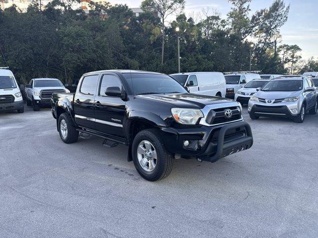 2014 Black Toyota Tacoma (5TFLU4EN0EX) with an 6 4.0 L engine, Automatic transmission, located at 27610 S Dixie Hwy, Homestead, FL, 33032, (305) 749-2348, 25.510241, -80.438301 - KBB.com Best Resale Value Awards. Only 56,851 Miles! Boasts 21 Highway MPG and 16 City MPG! This Toyota Tacoma boasts a Regular Unleaded V-6 4.0 L/241 engine powering this Automatic transmission. Wheels: 16 x 7J+30 Style Steel, Urethane Gear Shifter Material, Transmission: 5-Speed Automatic w/ECT-i. - Photo#6