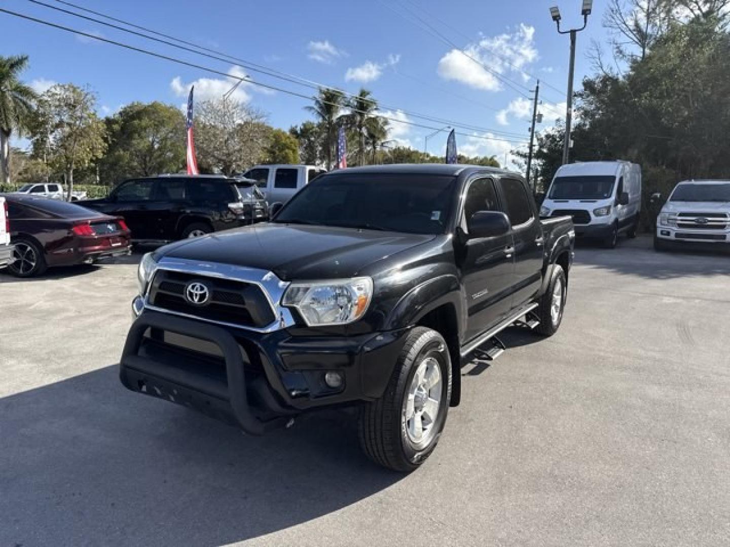2014 Black Toyota Tacoma (5TFLU4EN0EX) with an 6 4.0 L engine, Automatic transmission, located at 27610 S Dixie Hwy, Homestead, FL, 33032, (305) 749-2348, 25.510241, -80.438301 - KBB.com Best Resale Value Awards. Only 56,851 Miles! Boasts 21 Highway MPG and 16 City MPG! This Toyota Tacoma boasts a Regular Unleaded V-6 4.0 L/241 engine powering this Automatic transmission. Wheels: 16 x 7J+30 Style Steel, Urethane Gear Shifter Material, Transmission: 5-Speed Automatic w/ECT-i. - Photo#0