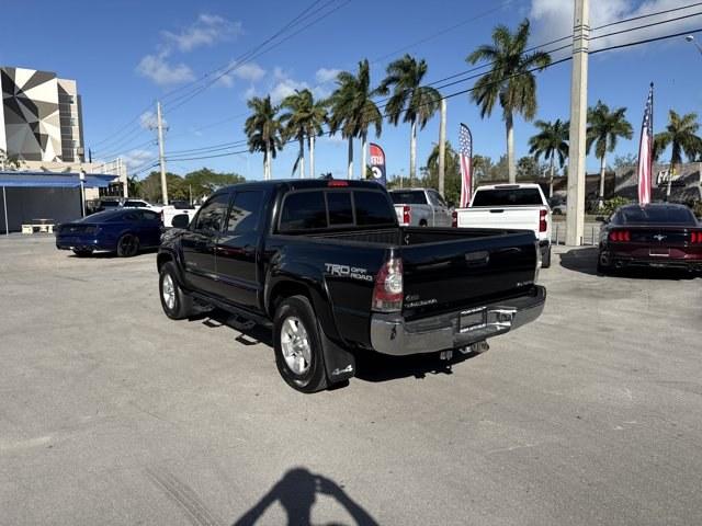 2014 Black Toyota Tacoma (5TFLU4EN0EX) with an 6 4.0 L engine, Automatic transmission, located at 27610 S Dixie Hwy, Homestead, FL, 33032, (305) 749-2348, 25.510241, -80.438301 - KBB.com Best Resale Value Awards. Only 56,851 Miles! Boasts 21 Highway MPG and 16 City MPG! This Toyota Tacoma boasts a Regular Unleaded V-6 4.0 L/241 engine powering this Automatic transmission. Wheels: 16 x 7J+30 Style Steel, Urethane Gear Shifter Material, Transmission: 5-Speed Automatic w/ECT-i. - Photo#2